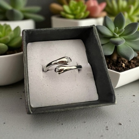 Silver Hug Hands Ring, Adjustable - Picture 1 of 3